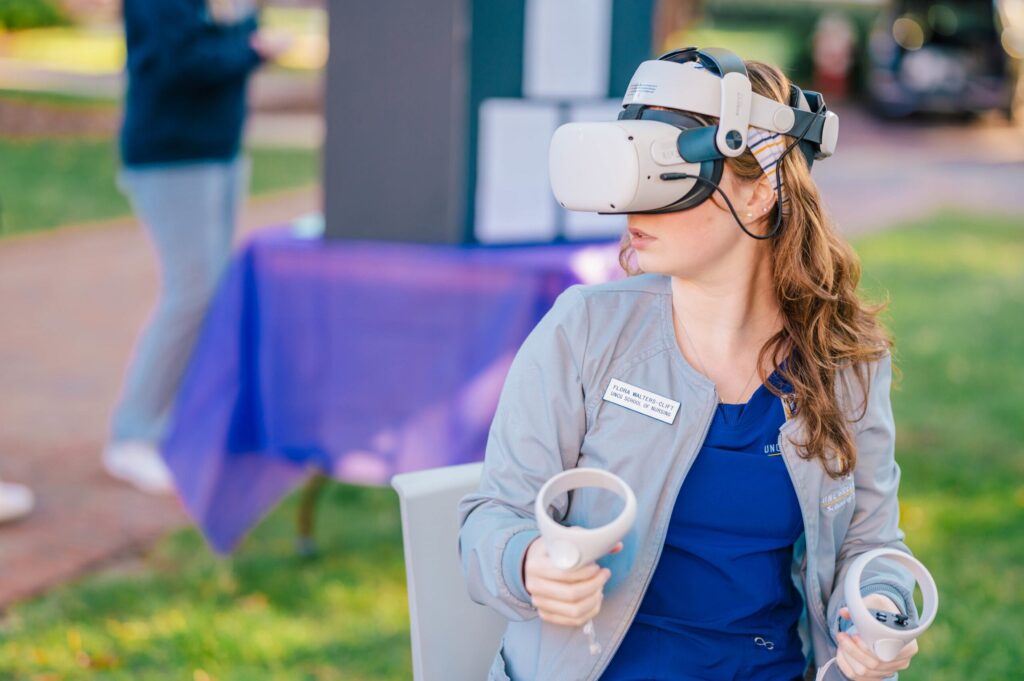 UNCG School of Nursing student participating in a virtual reality (VR) simulation.