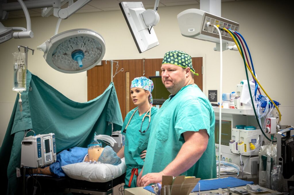 Nurse Anesthesia students engaging in simulation in the OR simulation suite.