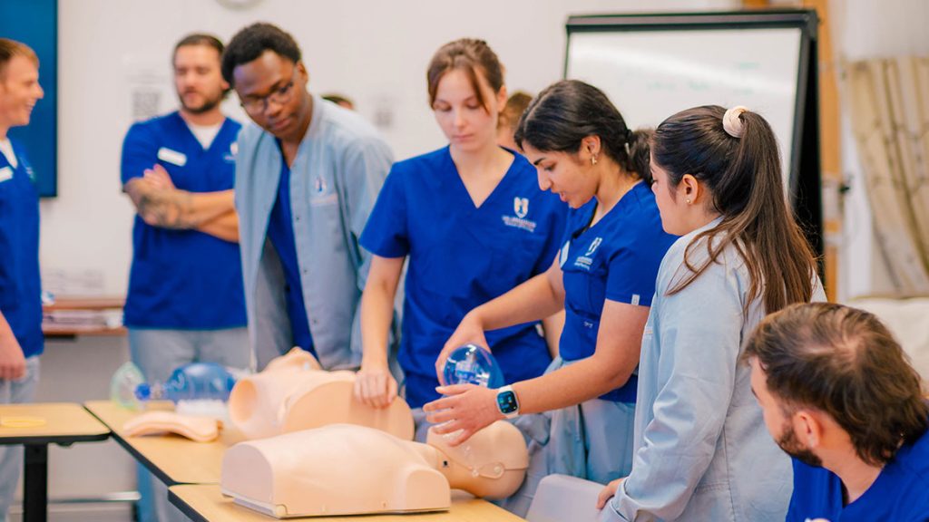 UNCG Nursing students in lab.