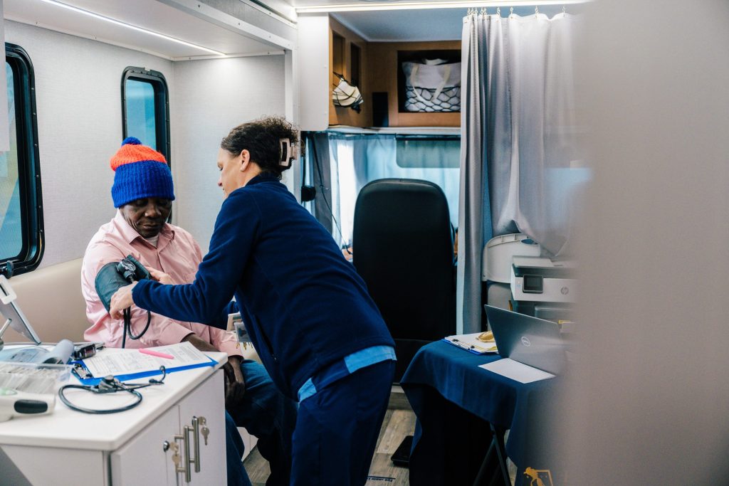 UNCG School of Nursing provides care inside Minerva's Mobile Health clinic, which is expanding services thanks to a $715,000 investment from UnitedHealthcare Community Plan of North Carolina